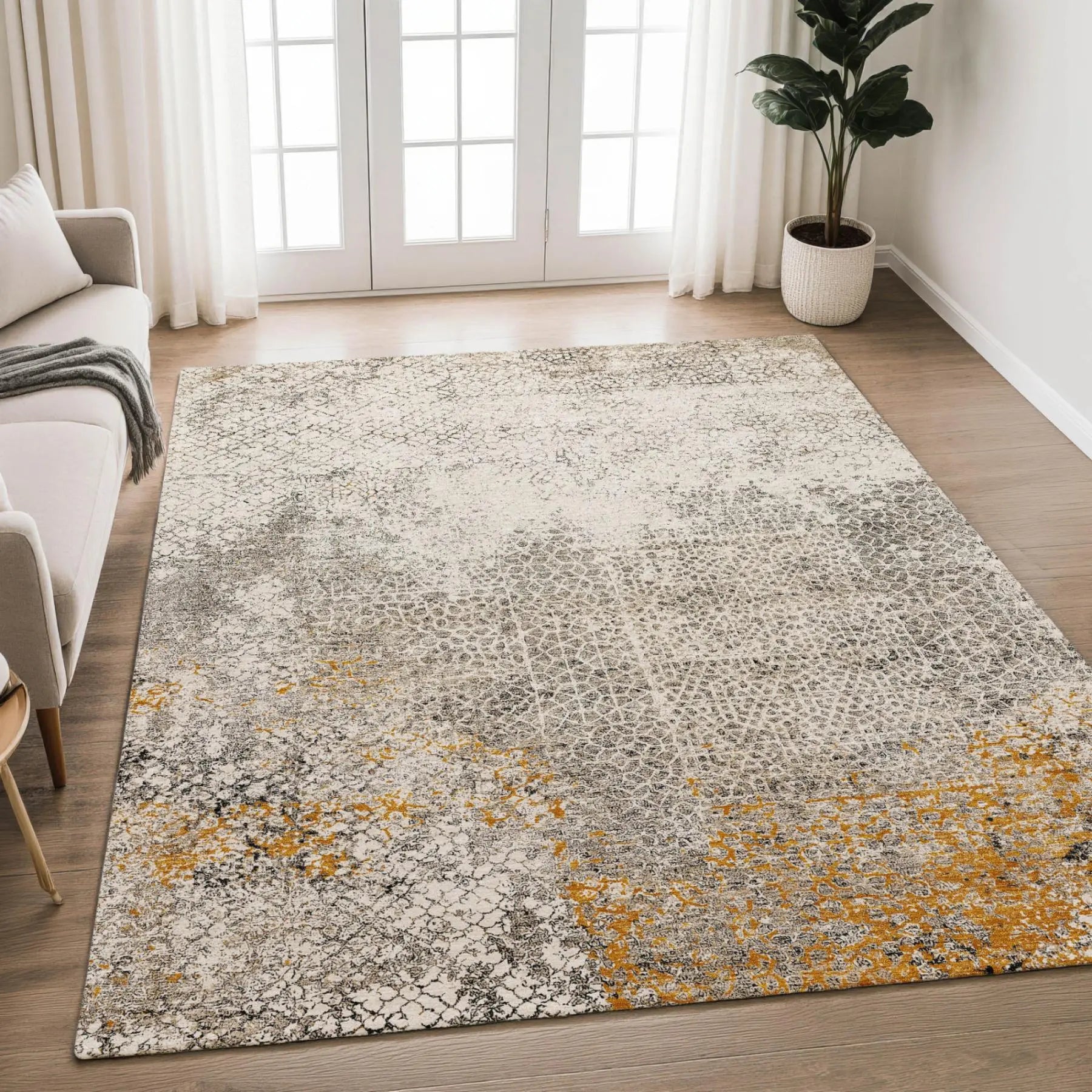 Gray and yellow abstract area rug, soft synthetic material, modern style, perfect for living room decor.