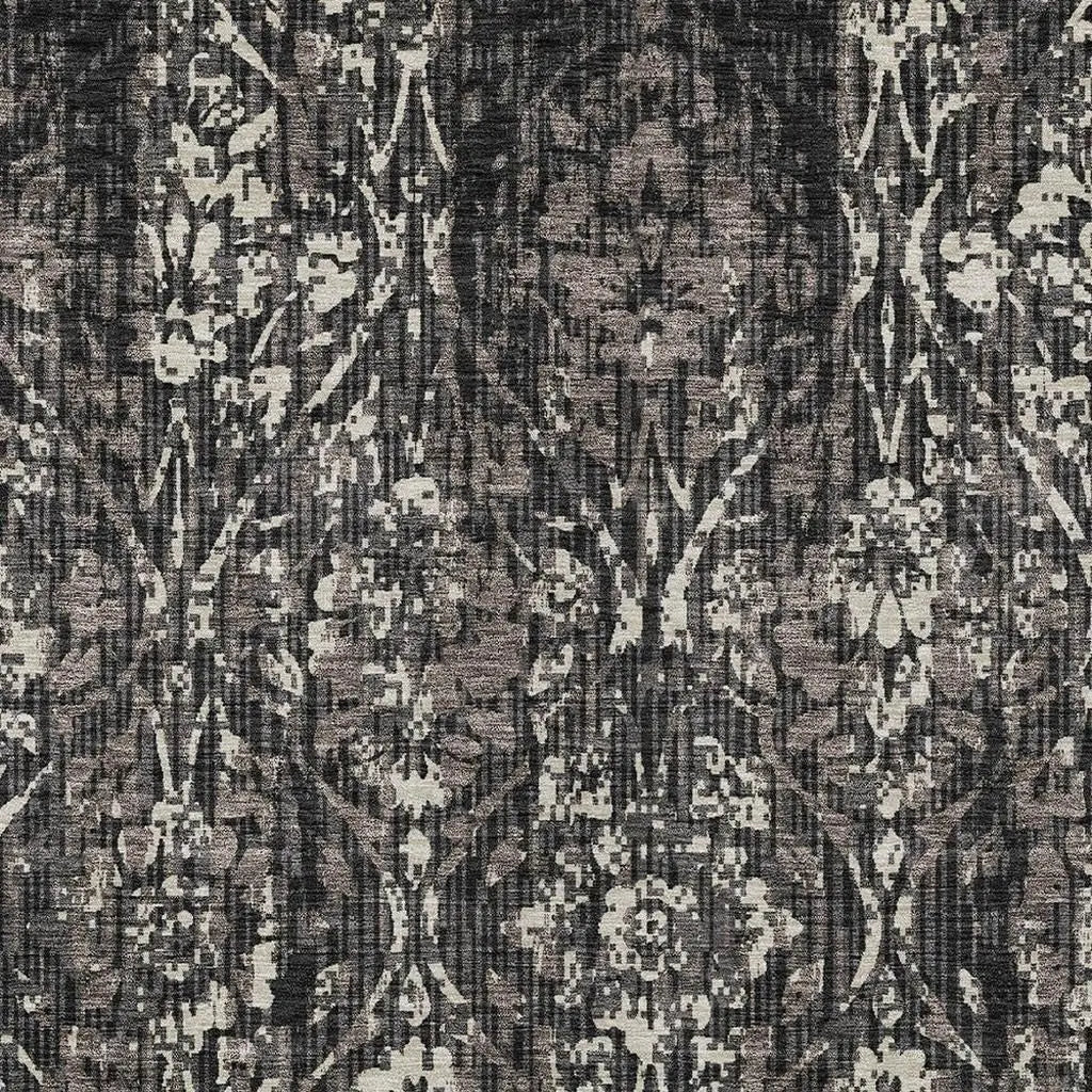 Elegant gray and black floral patterned fabric, textured upholstery material, perfect for stylish home decor.