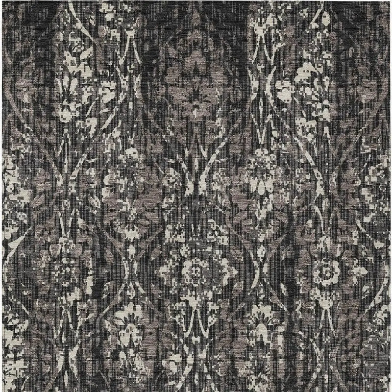 Black and gray floral patterned upholstery fabric, soft texture, ideal for modern home decor and furniture projects.