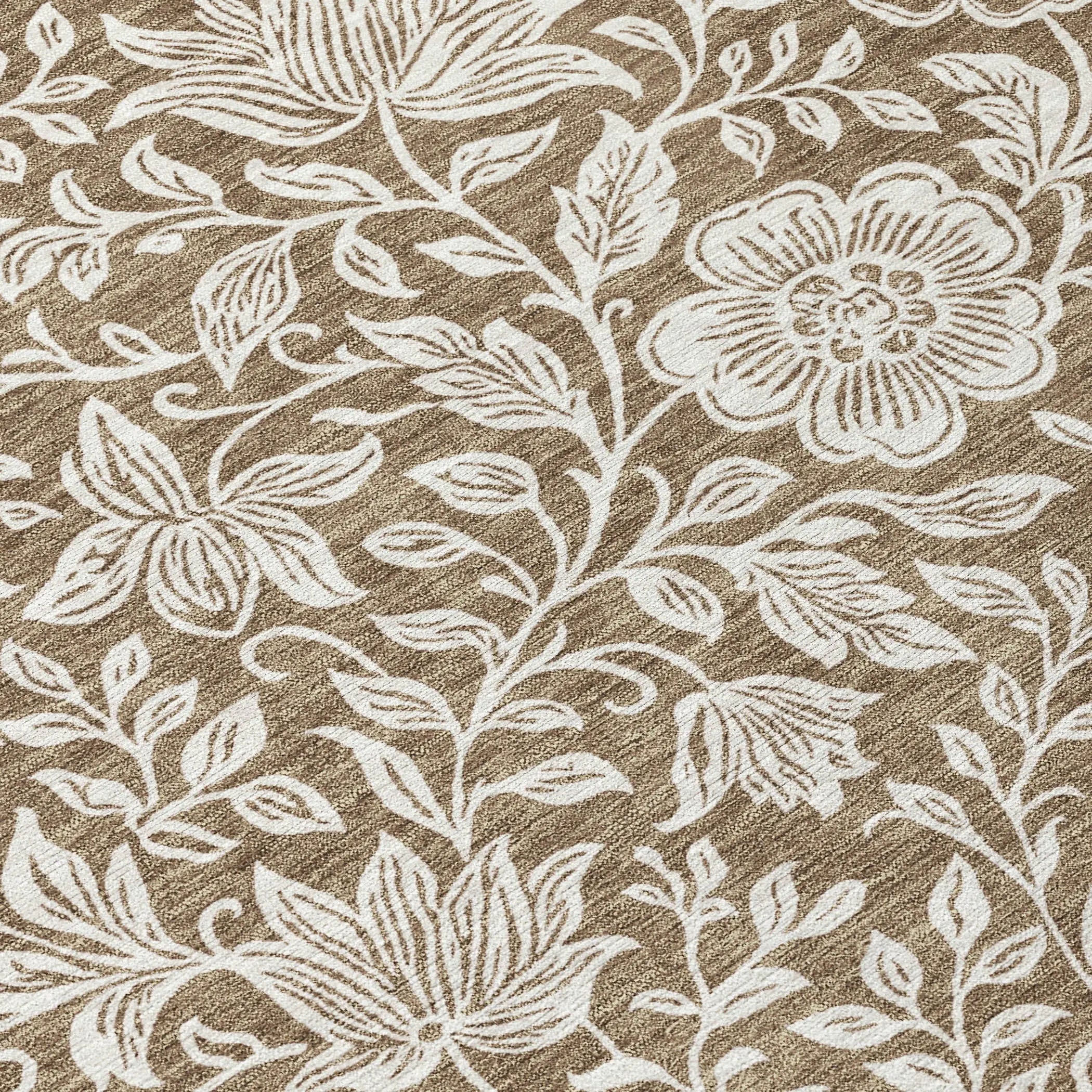 Beige floral area rug with white embroidery, featuring intricate flower and leaf patterns for a stylish home decor accent.