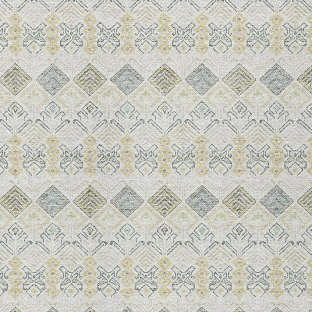 Geometric patterned fabric in cream, yellow, and blue tones, perfect for home décor and upholstery projects.