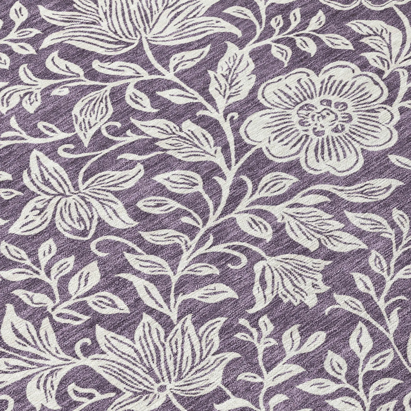 Purple floral patterned area rug with white embroidery, perfect for stylish home decor.