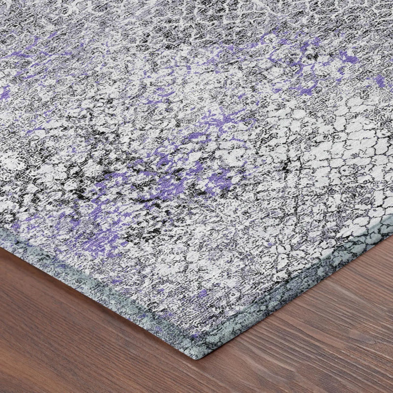 Textured gray and purple abstract area rug, modern design, perfect for contemporary home decor.
