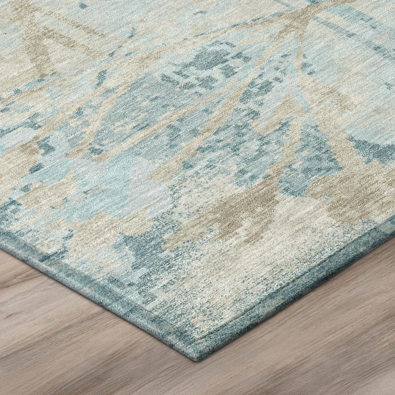 Light blue and beige abstract area rug, soft polyester material, modern design for contemporary spaces.