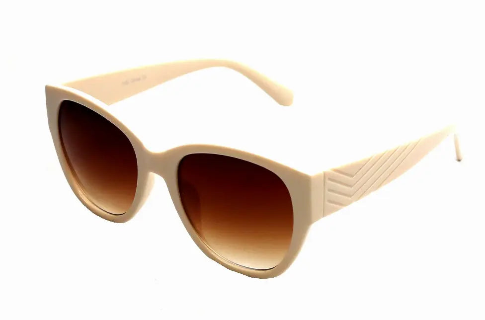 Cream oversized cat-eye sunglasses with gradient brown lenses and textured side detailing. Perfect for trendy summer styles.