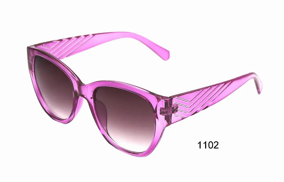 Pink cat-eye sunglasses with gradient lenses and striped detailing on the temples, perfect for a trendy summer look.