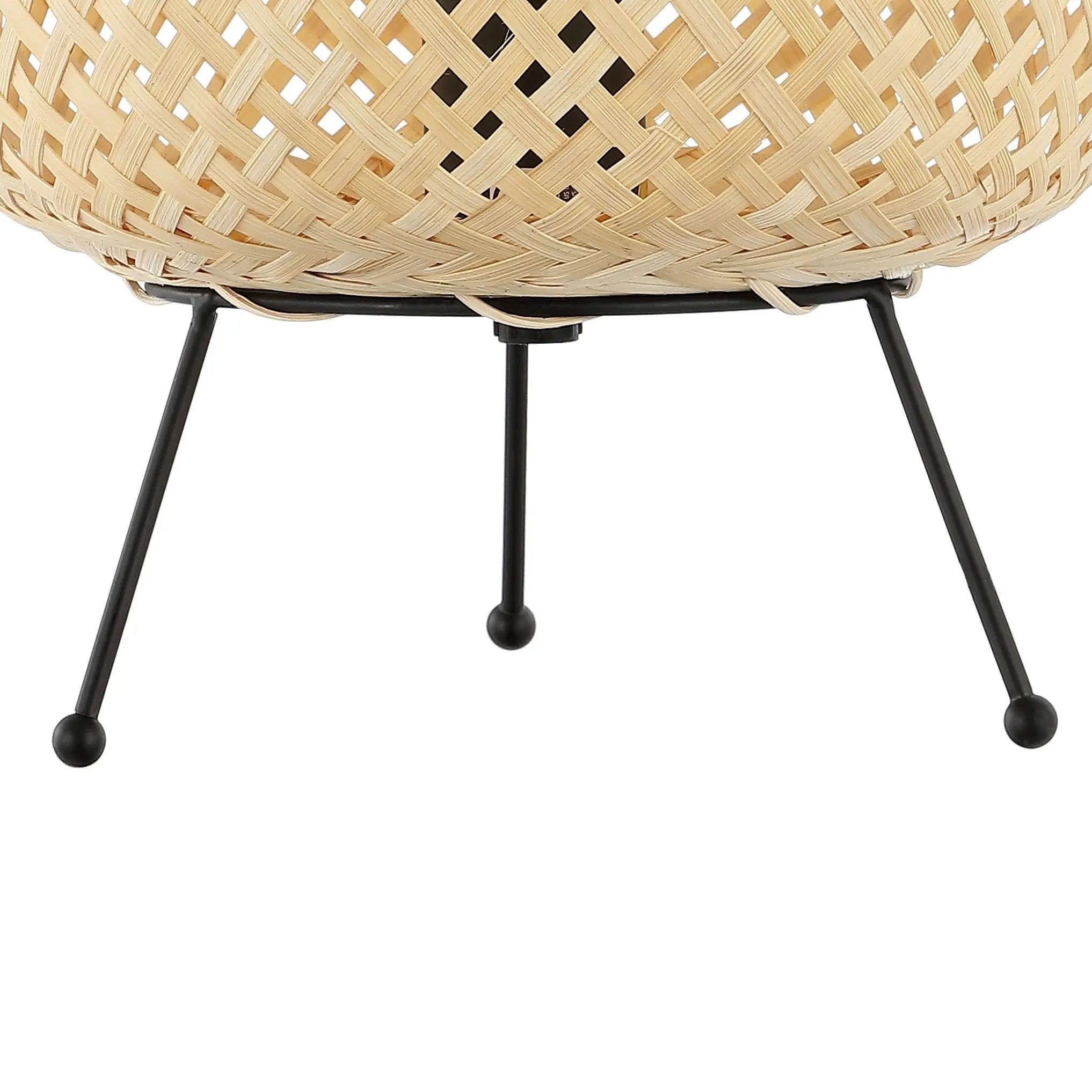 Natural wicker planter with black metal legs, stylish and modern home decor accent for indoor or outdoor use.
