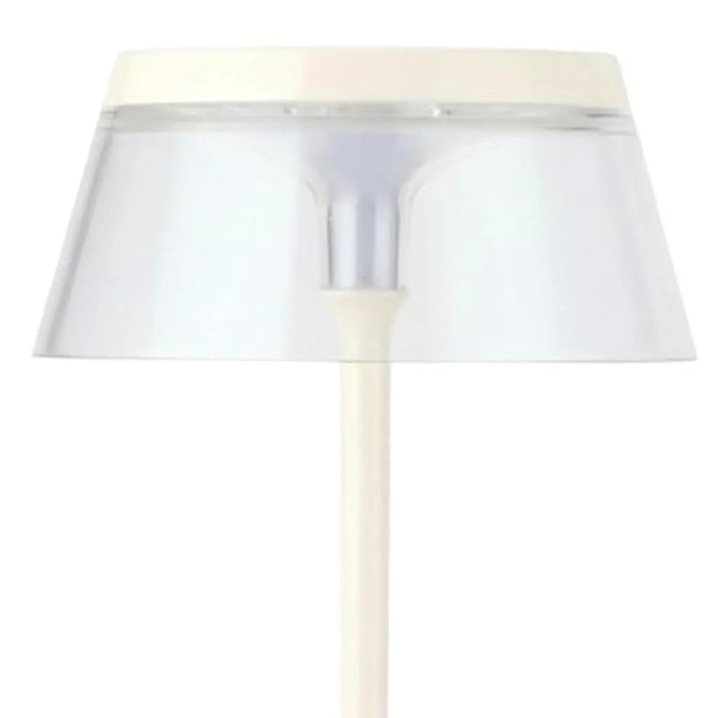 Modern white and clear acrylic table lamp with a sleek, minimalist design. Stylish lighting for contemporary decor.