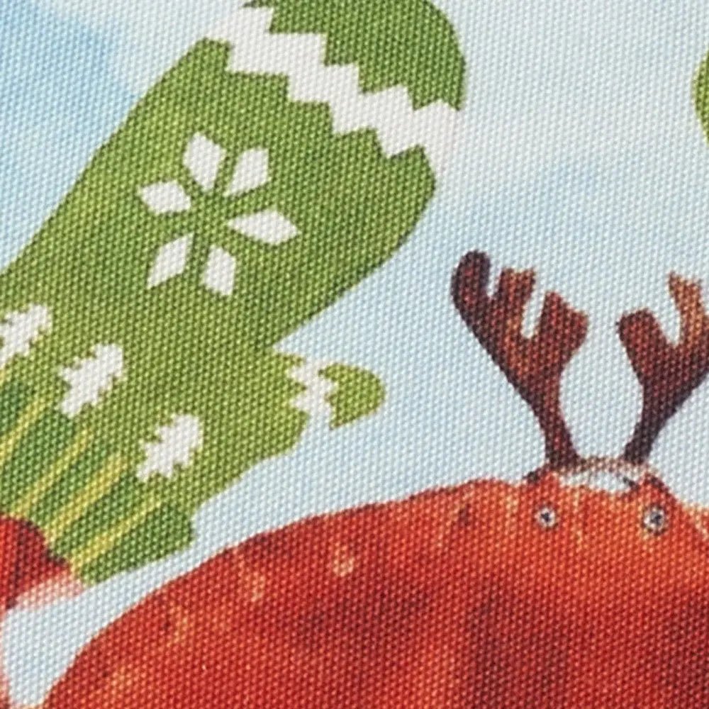 Red reindeer print fabric with green mittens and snowflakes, perfect for festive holiday decorations or sewing projects.