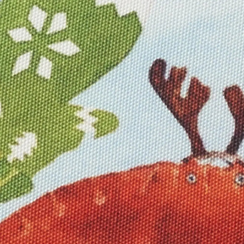 Red and green reindeer-patterned canvas fabric with festive motifs, perfect for holiday crafts and decorations.