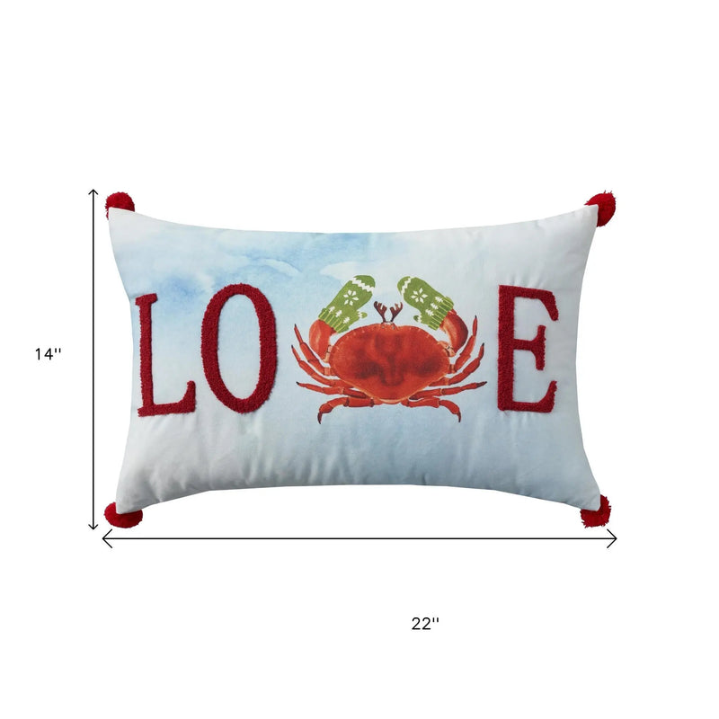 Decorative coastal pillow, 22"x14", featuring "LOVE" in red with a watercolor crab print and red pom-pom tassels.