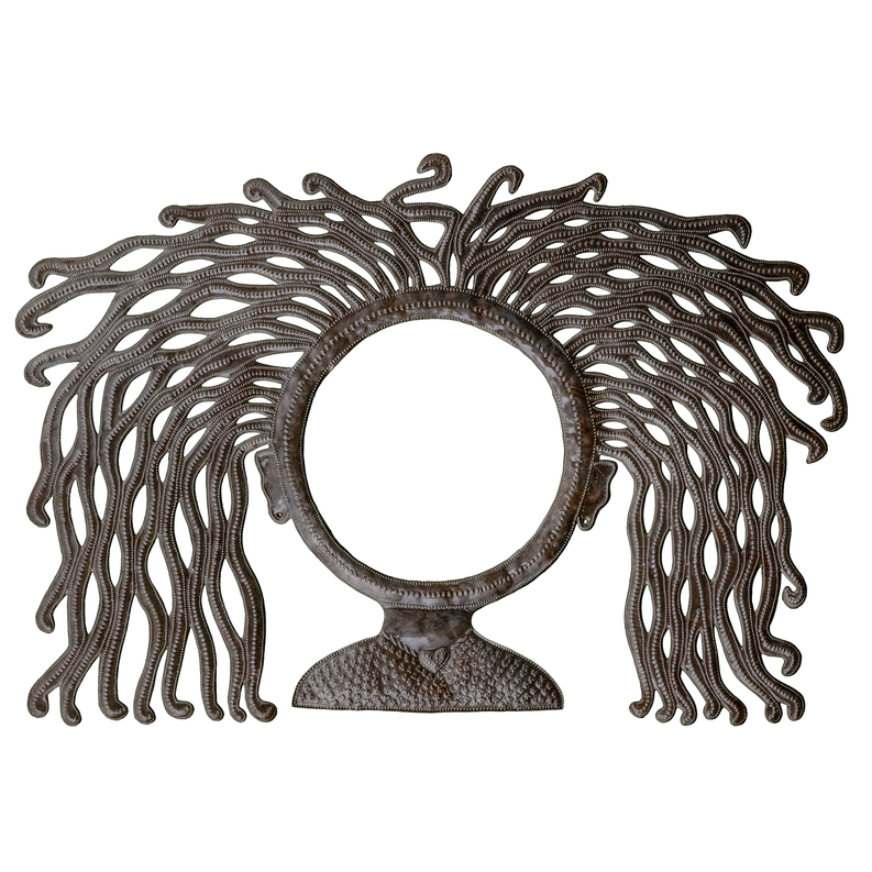 Tabletop hair mirror with round glass center and ornate ribbonlike metal hair frame
