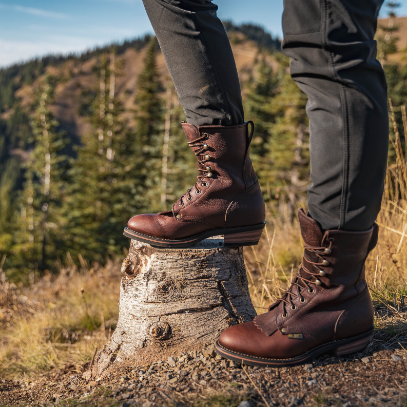 Men's 9-inch packer boots on a log, dark brown leather, lace-up