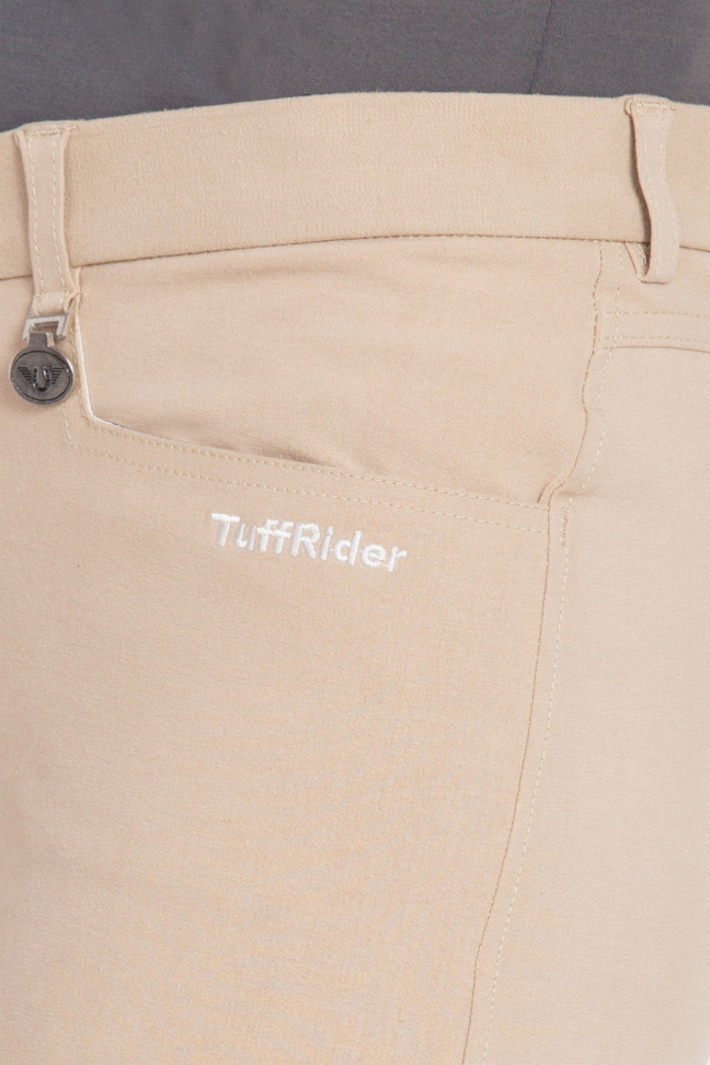 Beige knee patch breeches waistband close-up with button and logo stitching