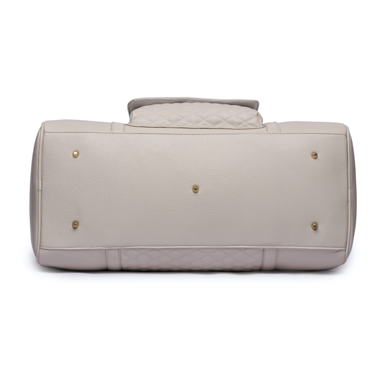 Pearl white travel bag with top handle and gold-tone snap details