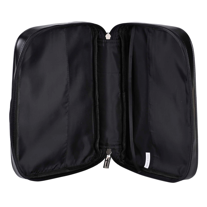 Black bible case open to show two fabric-lined compartments with zippers.