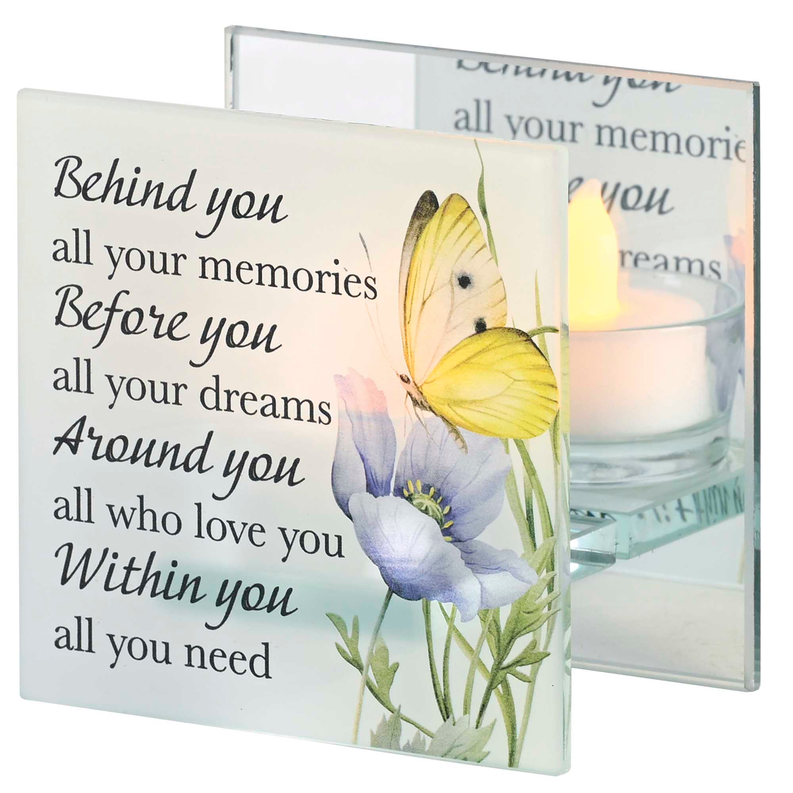 Two-panel teal light holder with butterfly artwork and glass candle flame visible