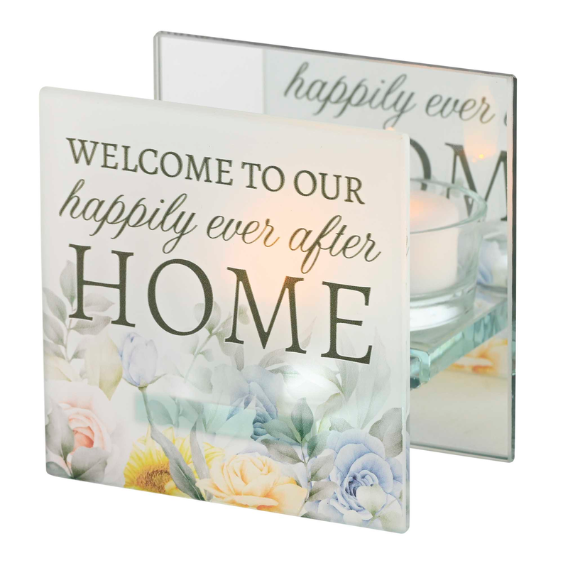 Floral welcome card set with “WELCOME TO OUR HOME” text and a lit tealight behind