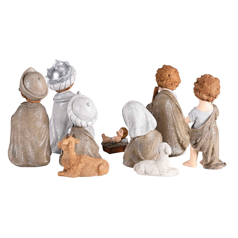 Nativity figurines set showing backs and side, with wise men, shepherd boy, and lamb