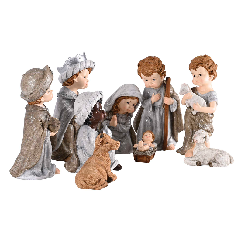 Nativity family figurines from side view, with kneeling shepherd and wise men in gray
