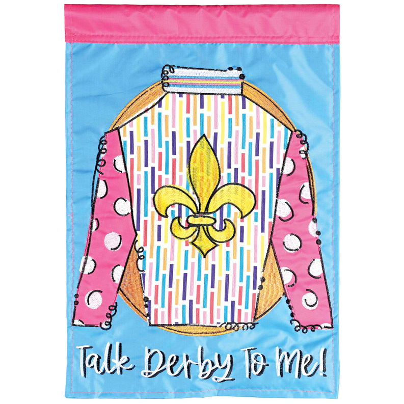 Garden flag close-up in blue and pink with fleur-de-lis and “Talk Derby To Me!” lettering.