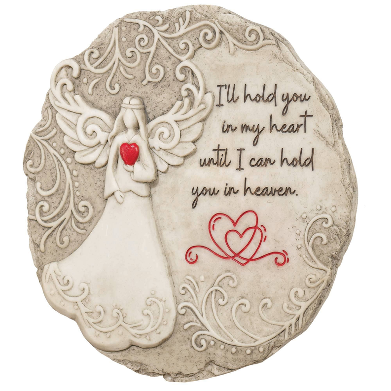Round garden stone plaque with angel hands, red heart, and winged scrollwork