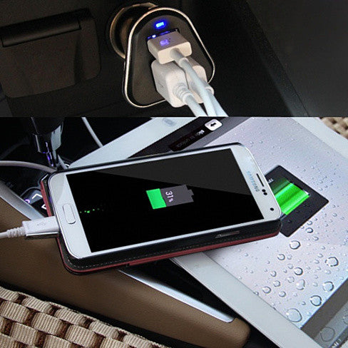 Triple USB car charger with blue indicator; smartphone connected and charging in car