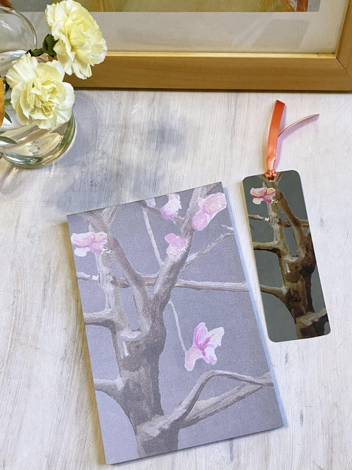 Floral notepad with tree and pink flowers, plus dark bookmark with ribbon