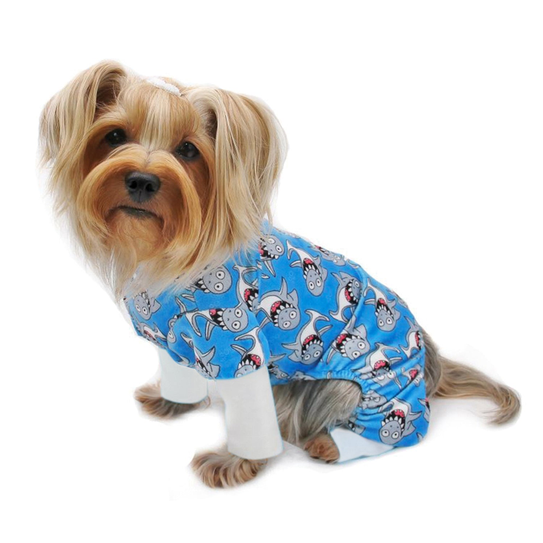 Blue shark-print minky pajamas with white cuffs, worn by small dog