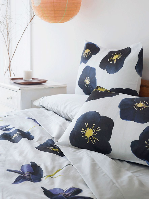 White duvet cover with dark navy flower print and two pillow covers