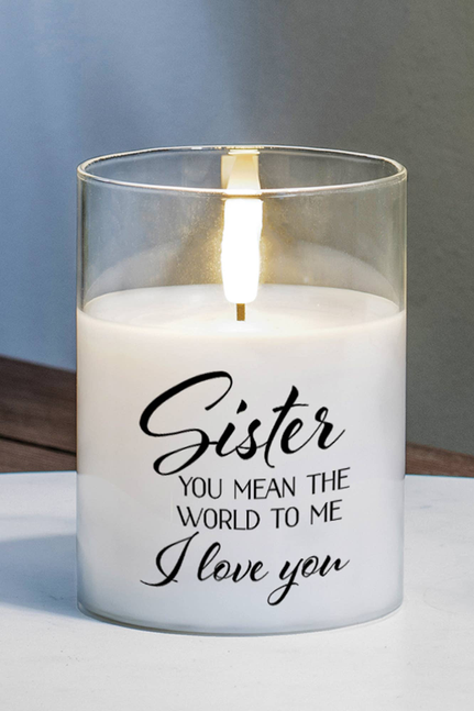 LED candle in clear glass jar with 'Sister' message, lit