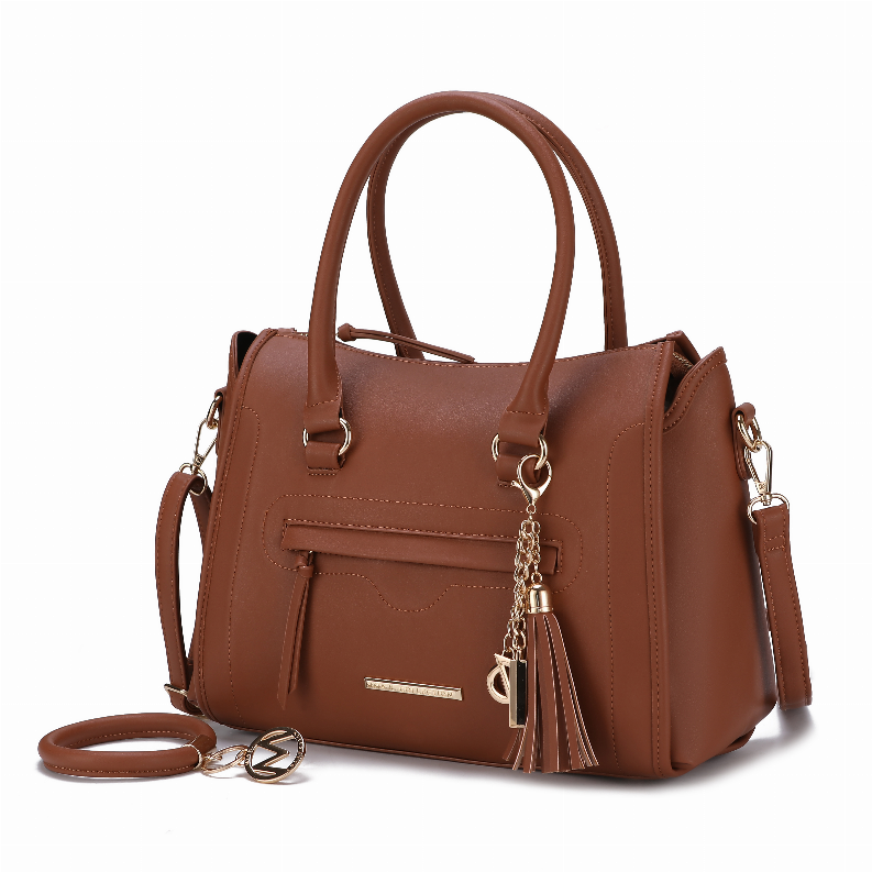 Brown satchel with chain keyring tassel, double handles, front pocket, and crossbody strap