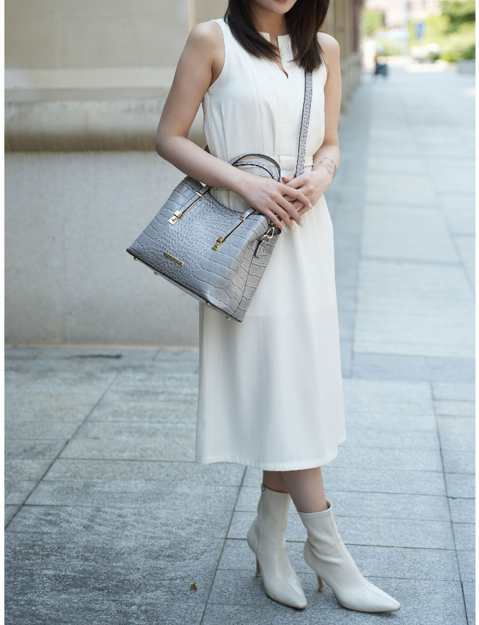 Crocodile-embossed vegan leather tote in gray with gold hardware and front panel detailing