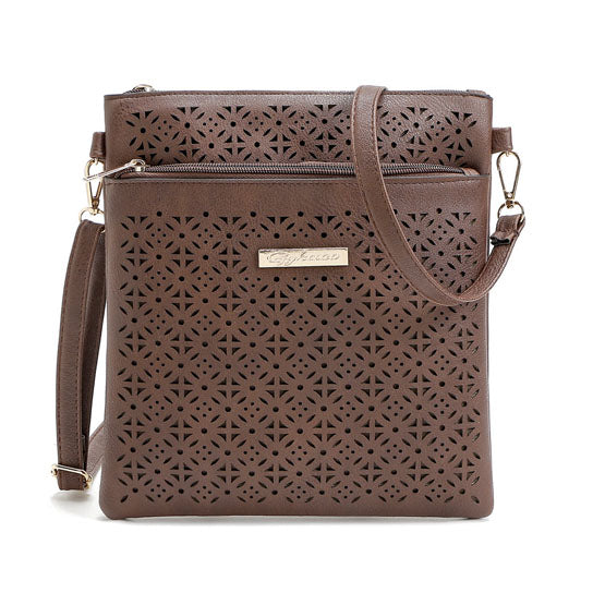 Brown perforated cutout flower handbag with zip top and adjustable crossbody strap