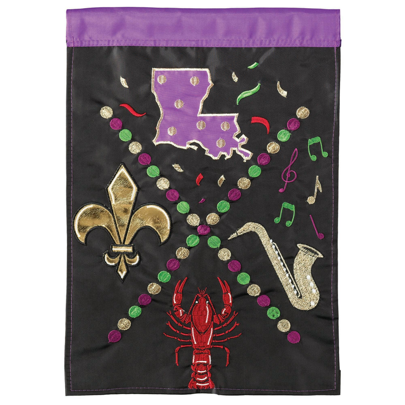 Black decorative flag with Louisiana purple map, Mardi Gras beads, sax, trumpet and fleur-de-lis