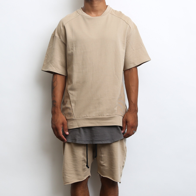 Khaki crewneck short-sleeve tee with raglan seams and long curved hem