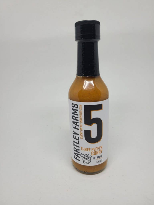 Fartley Farms hot sauce bottle 5, Three Pepper Curry, amber sauce, black screw cap
