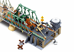 Army building set side view with green launcher arms, soldiers, and gray artillery