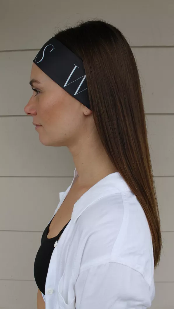 Black headtie with light geometric print, side profile