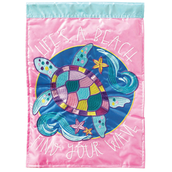 Pink poly garden flag with colorful sea turtle and ocean-themed graphic