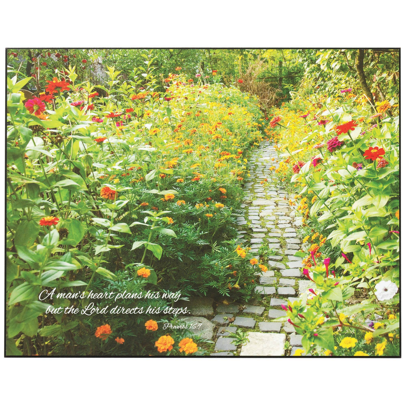 Rectangular wall plaque showing stone walkway through colorful flowers and cursive quote