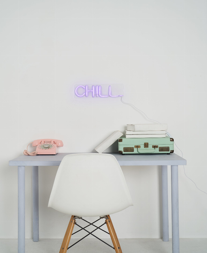 CHILL LED neon sign with purple-blue glowing letters