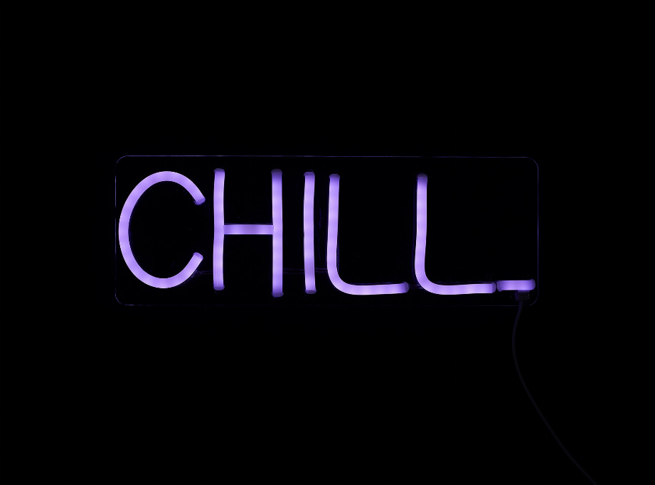 CHILL LED neon sign with purple-blue glow and clear frame housing