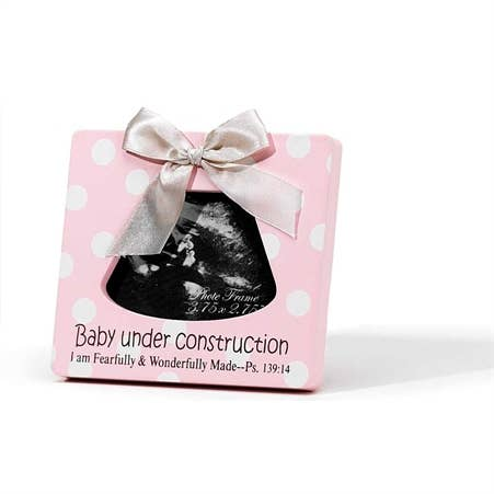 Pink polka-dot framed baby photo keepsake with black insert and white satin bow