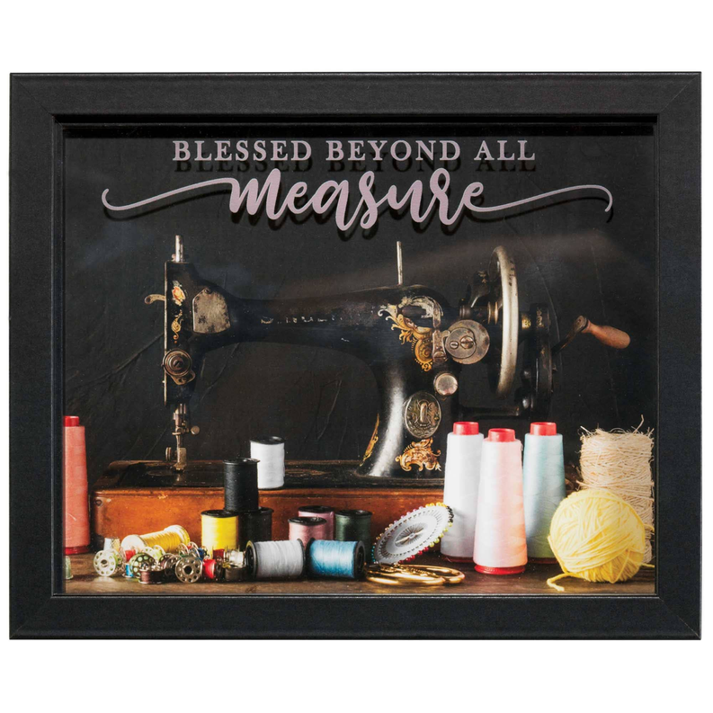 Framed sewing wall art with “Blessed Beyond All Measure” and vintage sewing machine