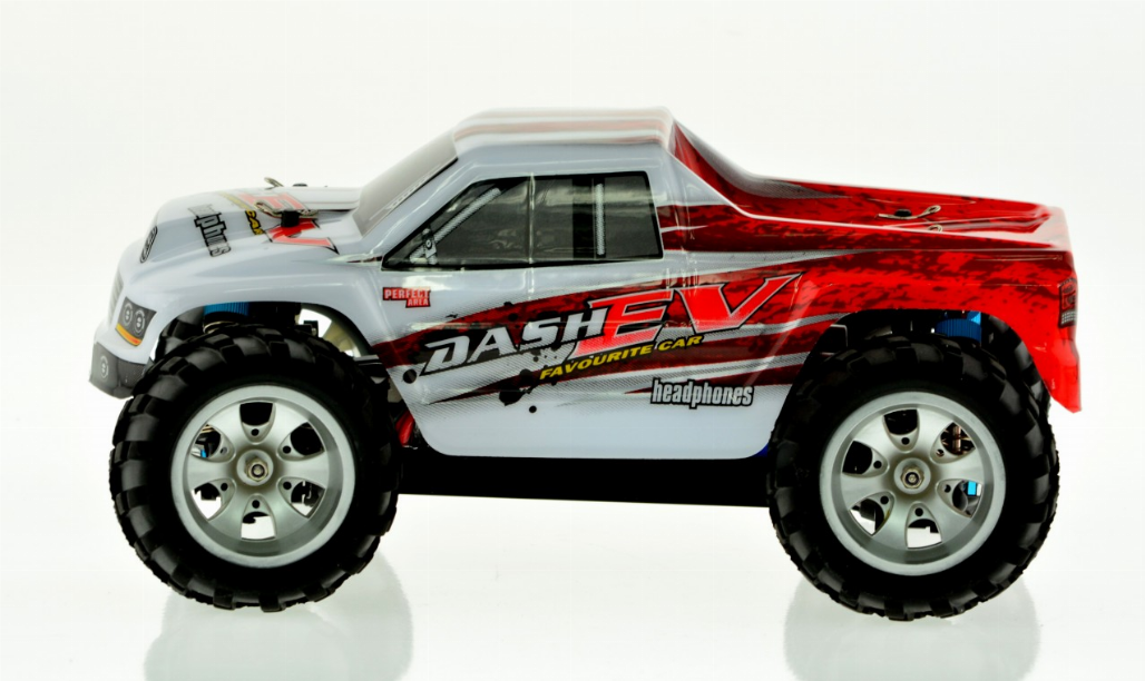 White and red 1:16 scale remote control monster truck side view with black tires and silver rims.