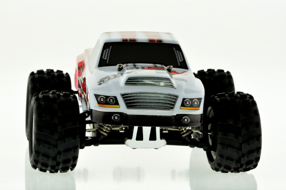 White and red 1:16 scale monster truck front view with grille and front suspension details.