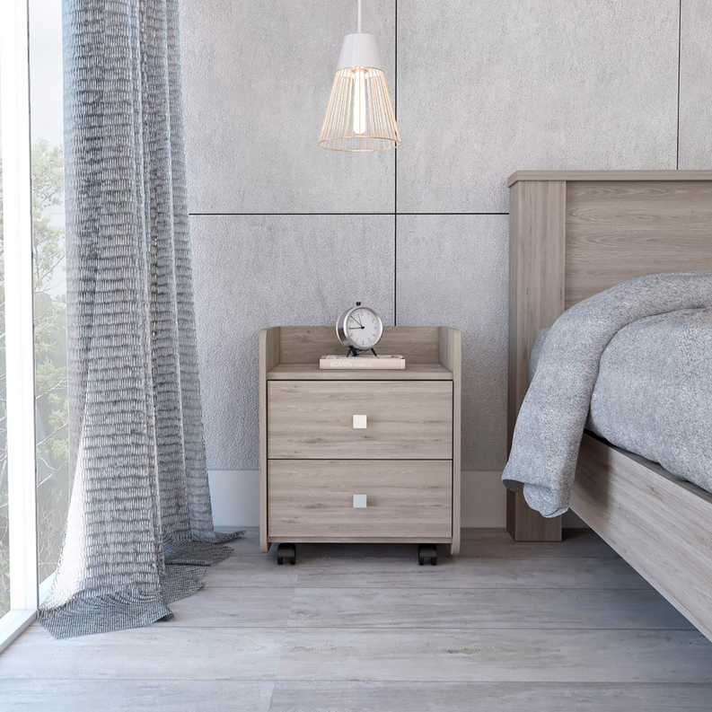 Light gray oak nightstand with two drawers and open top shelf on casters