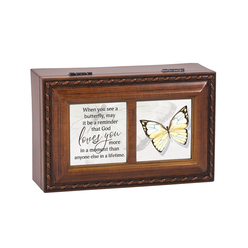 Wooden music box with hinged lid and butterfly window, dark ornate trim
