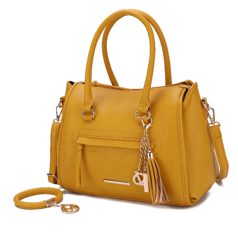 Mustard satchel bag with top handles, crossbody strap, and chain keyring